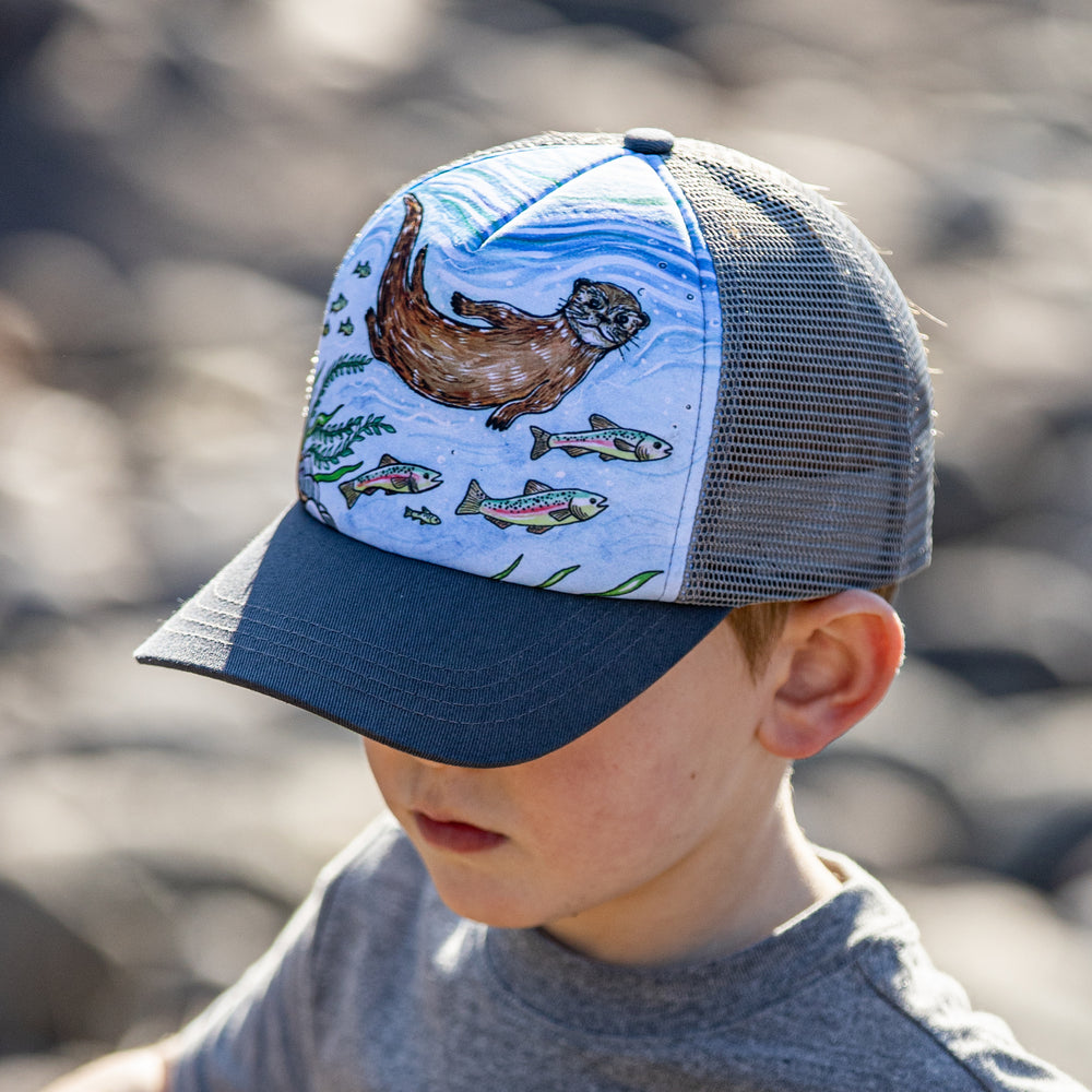 Boy wearing a Sunday Afternoons River Otter Trucker